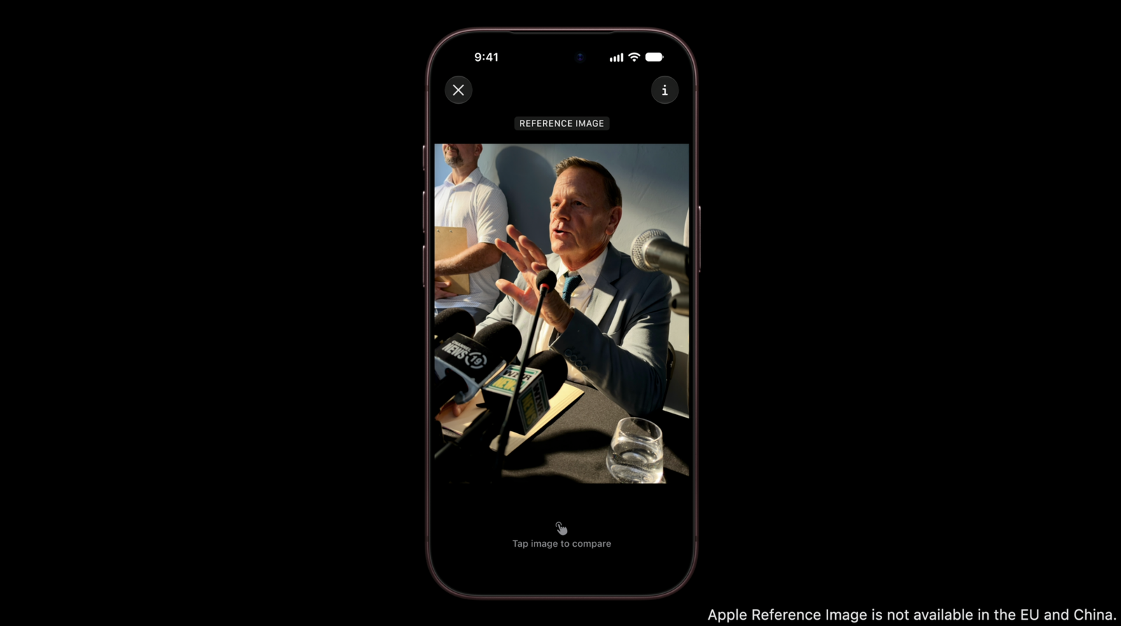 man having his photo taken from the perspective of the iphone camera